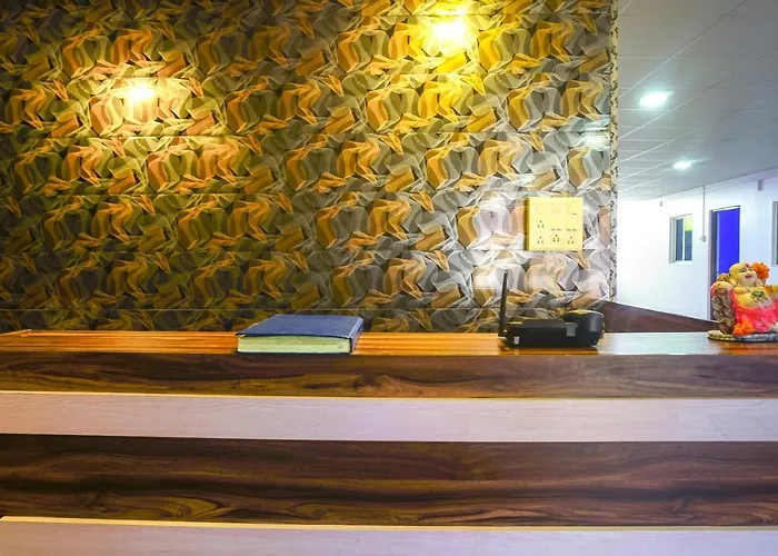 Spot On 43036 Gokul Lodge And Mauli Pure Veg Restaurant