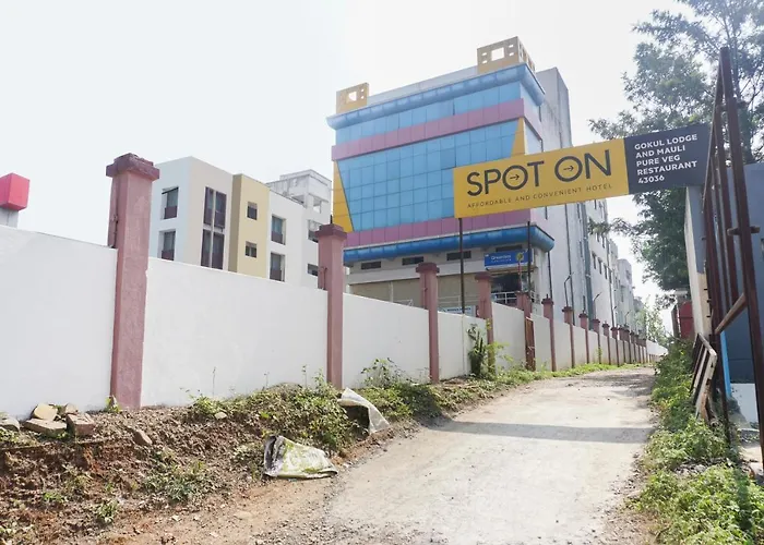 Spot On 43036 Gokul Lodge And Mauli Pure Veg Restaurant